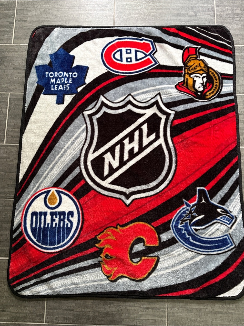 NHL Team Logo Plush Throw
